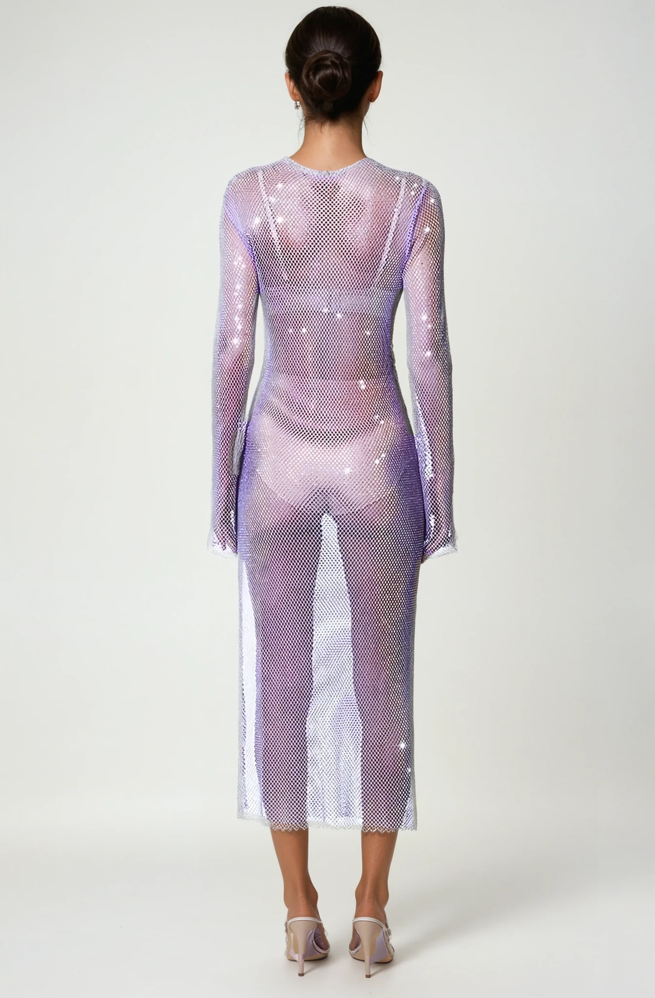 Front view of the Luminelle Rhinstone Mesh maxi dress in lavender on model showing full length sleeves and slim fir