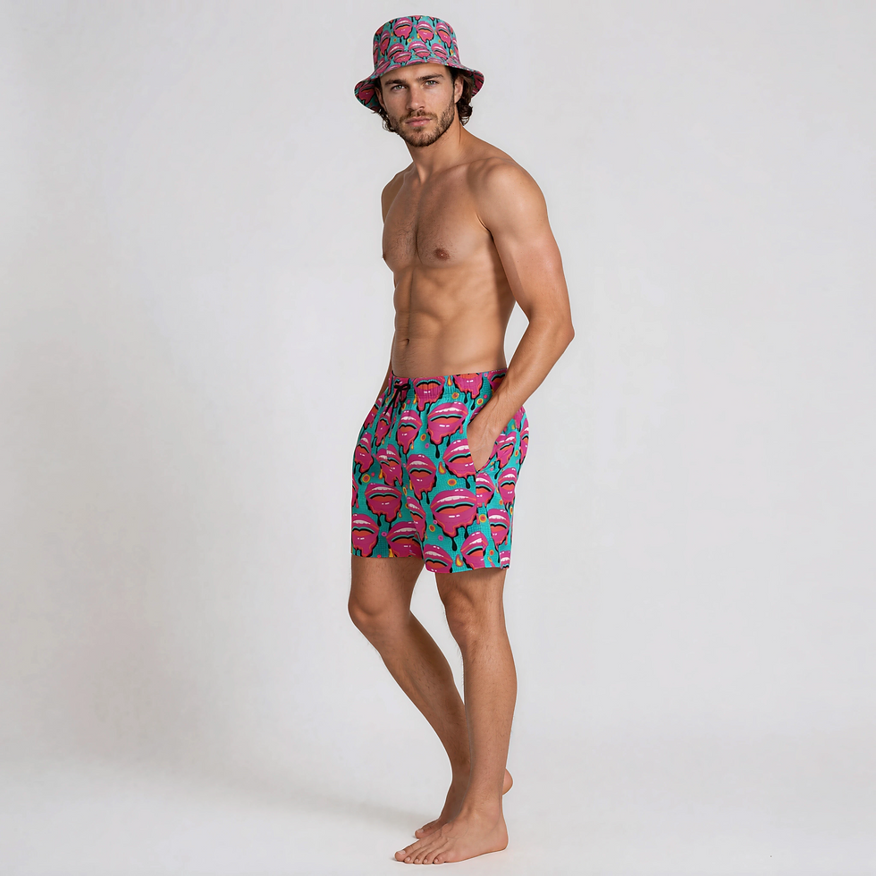 Thumbnail: Side view of the Lipsy pop art print beach shorts on male model showing pockets and fit