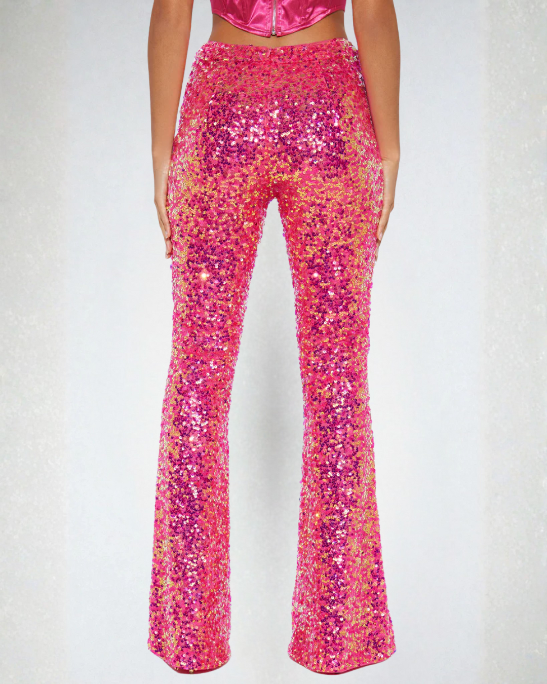 Back lower view of the #Barbie pink sequin flares, on model showing design and fit