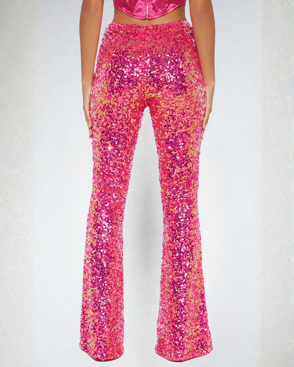 Thumbnail: Back lower view of the #Barbie pink sequin flares, on model showing design and fit