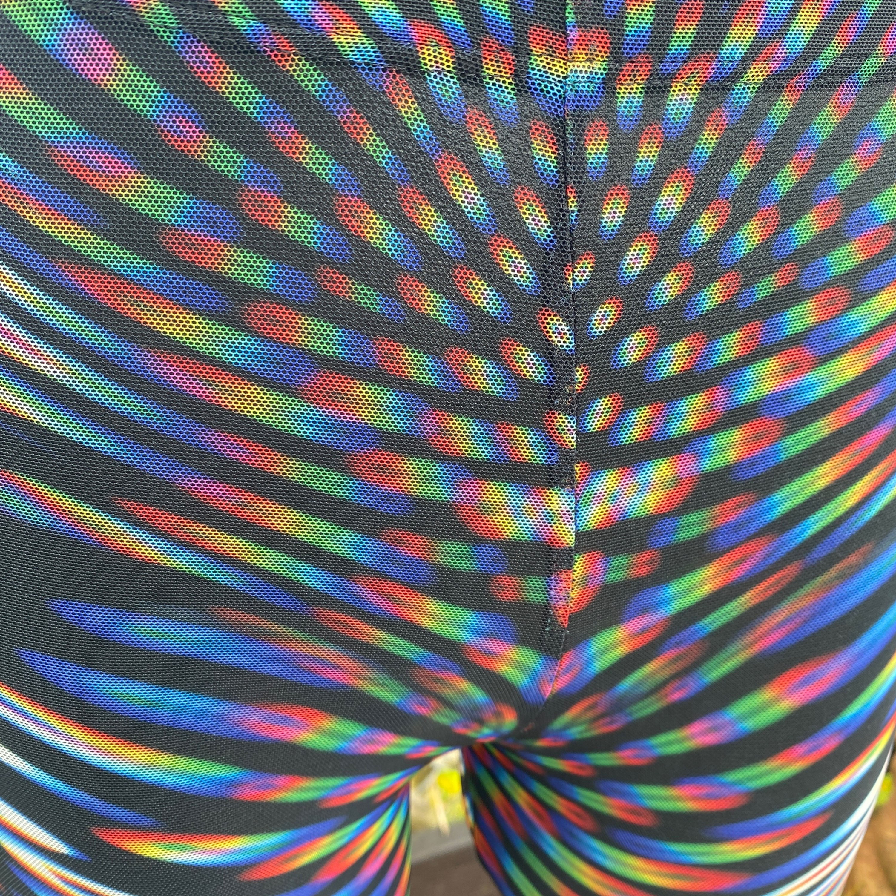 Close view of the Static Mesh Leggings showing glitched psychedelic mesh print