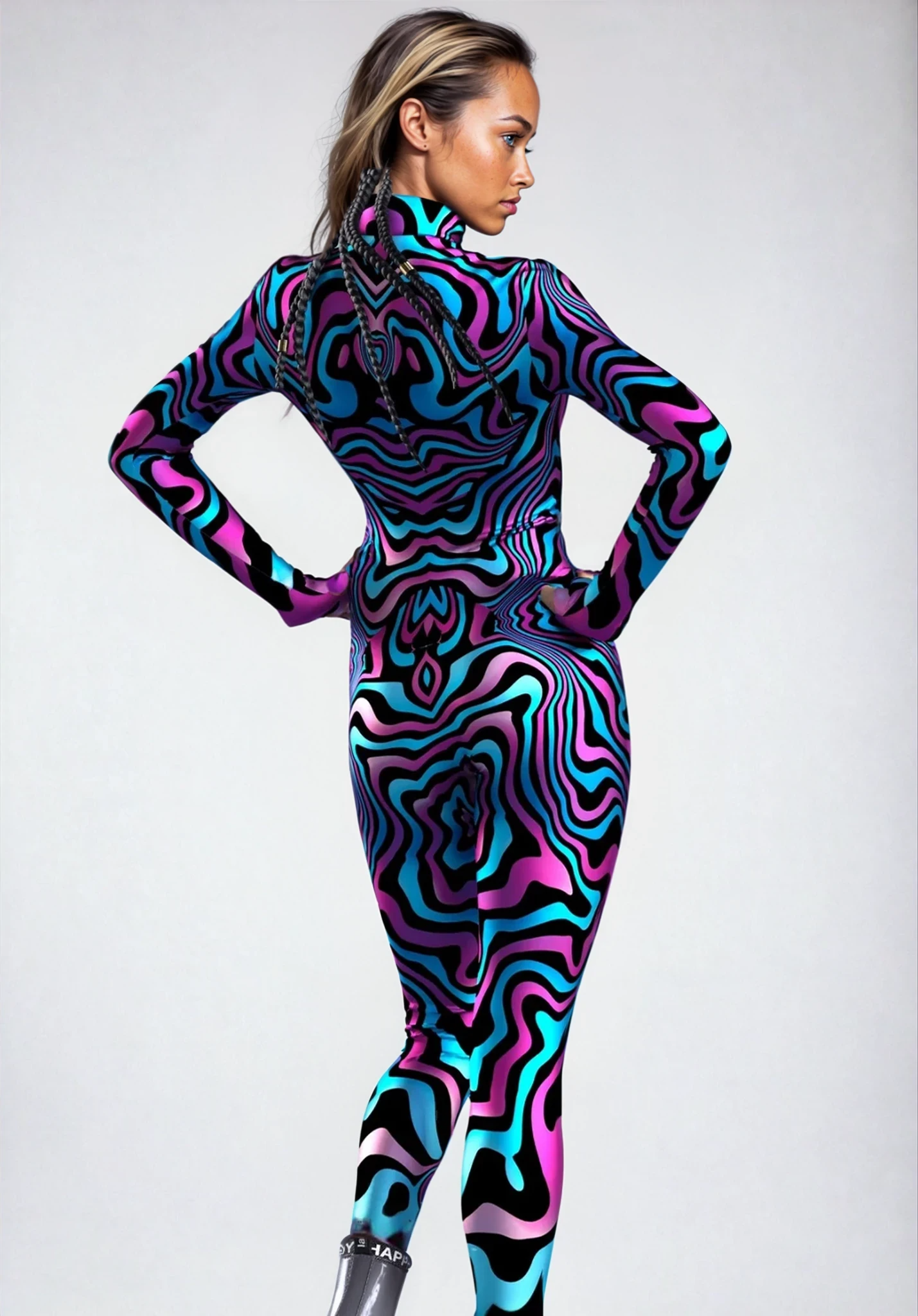 Back view of the Gender Fluid pink and blue marble print festival jumpsuit on model in studio