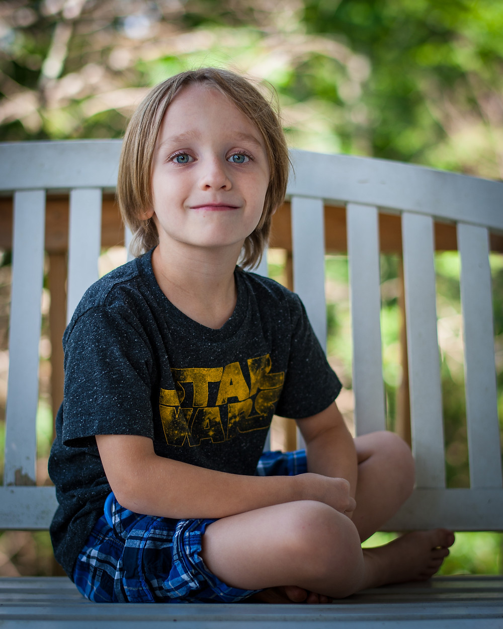 Child on porch - distracting background