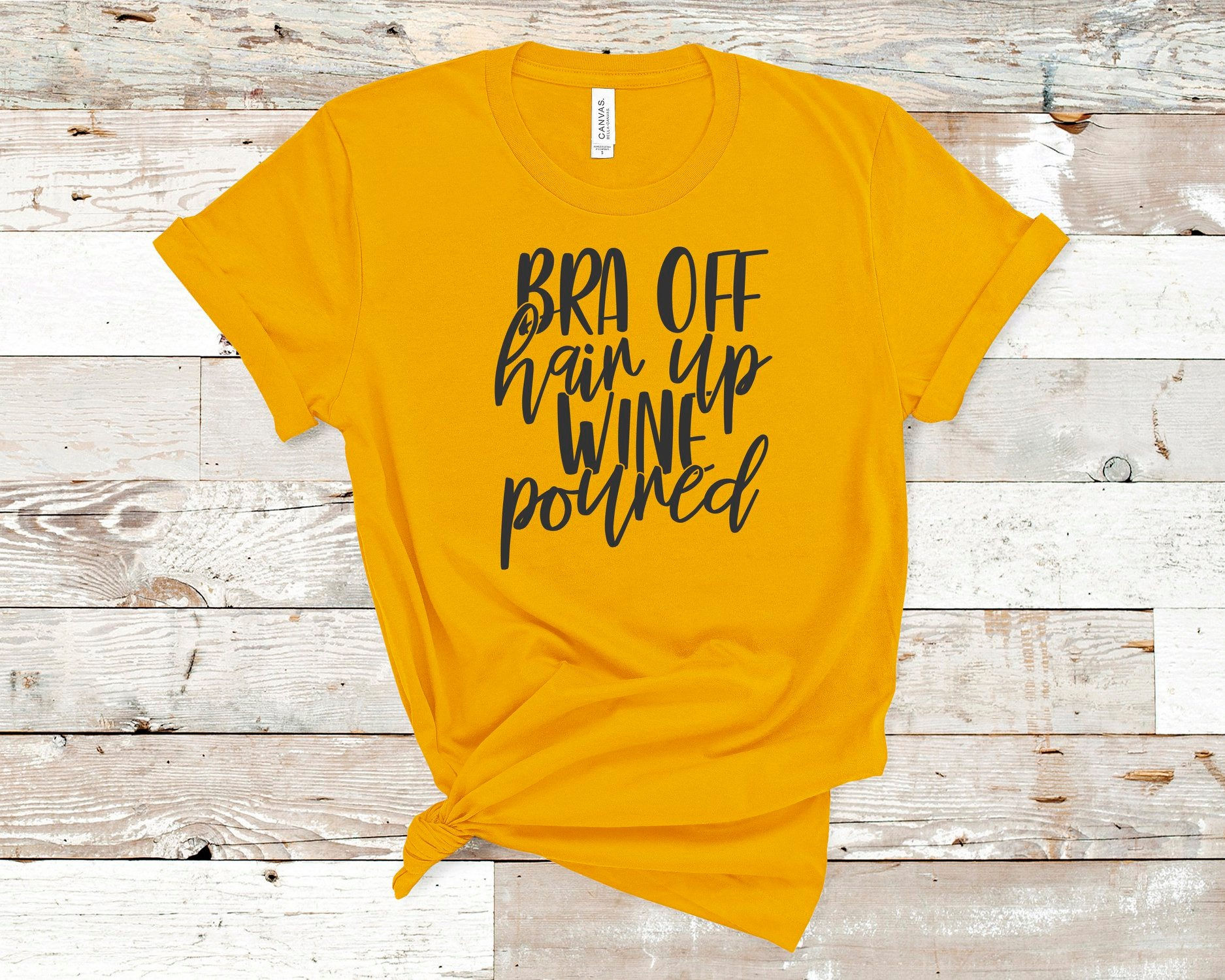 Bra off, hair up, wine poured