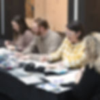 Principal employees decorating Welcome Home Kits