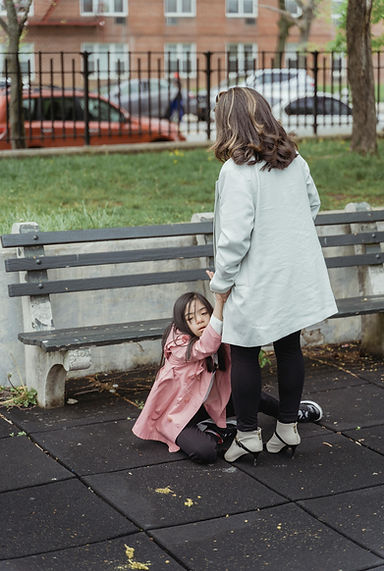 Overwhelmed mother of a special needs child in the park