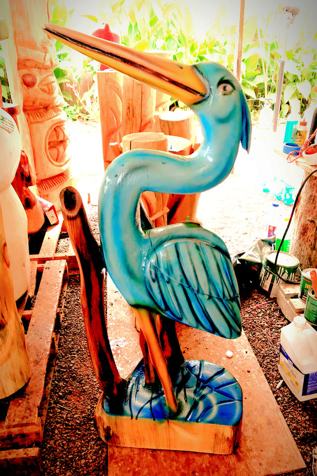 Tiki Murph white pine carved blue heron with flat back.