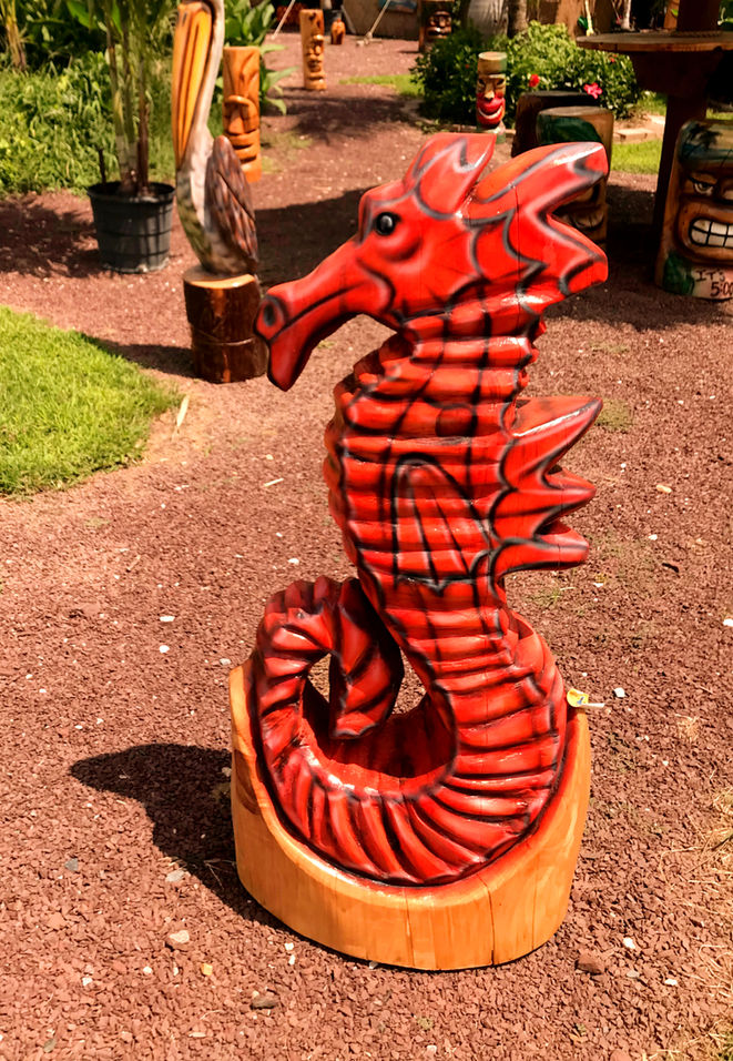 Tiki Murph white pine carved red seahorse
