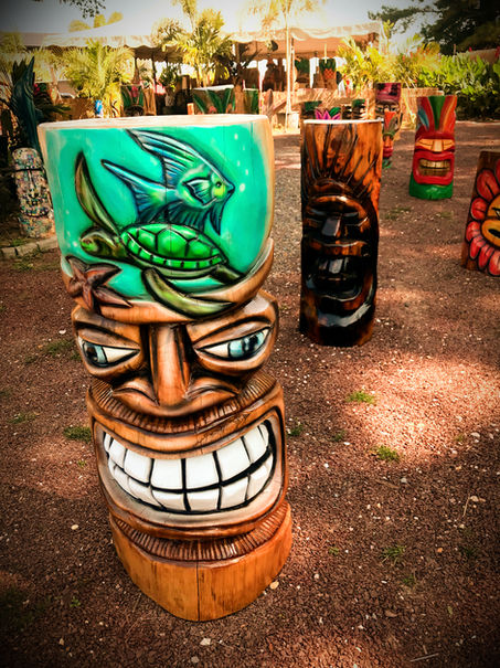 Tiki Murph carved pine half tiki face with aquatic airbrush design.