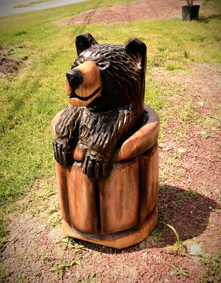 Tiki Murph white pine carved black bear in a barrel.
