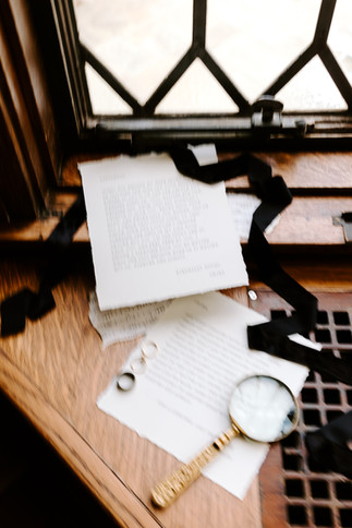 A blurry motion image of wedding vows typed on a typewriter