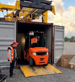 PLP forklift removing cargo from the container