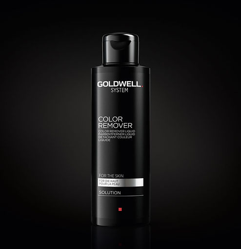 Goldwell System Color Remover bottle on black background