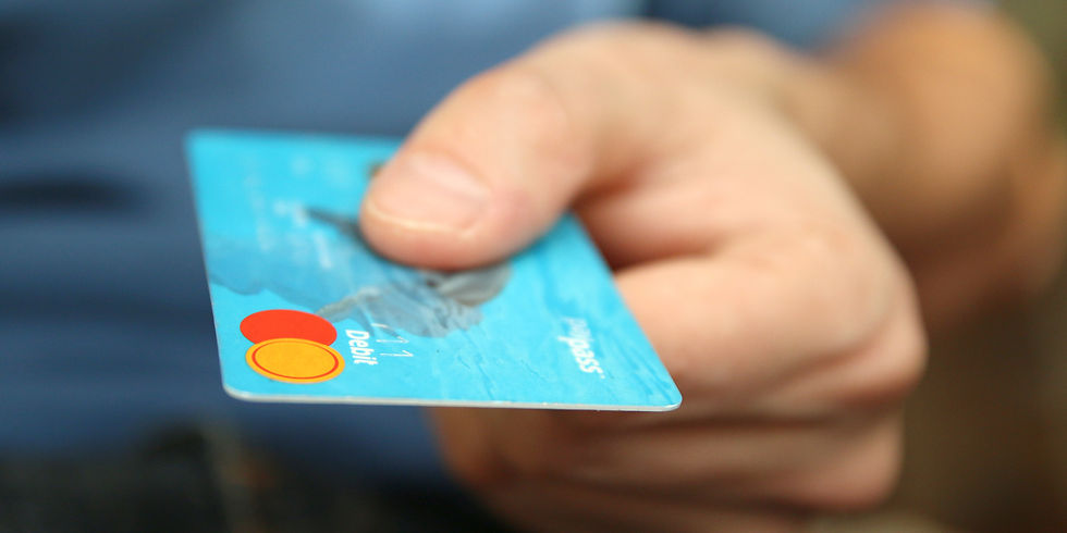 person holding credit card