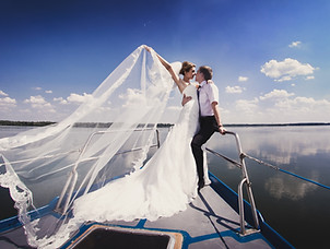 Just married couple on yacht. Happy bride and groom on their wedding day.jpg