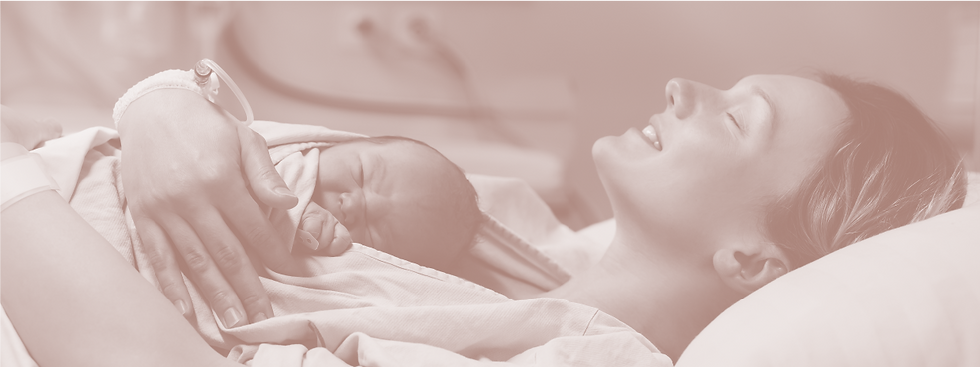 A woman holding a baby