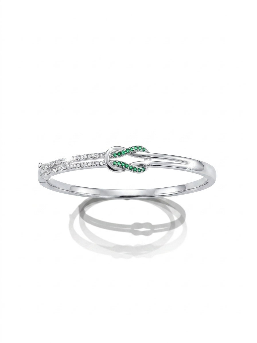 Elegant Emerald Infinity Knot Sterling Silver Bracelet