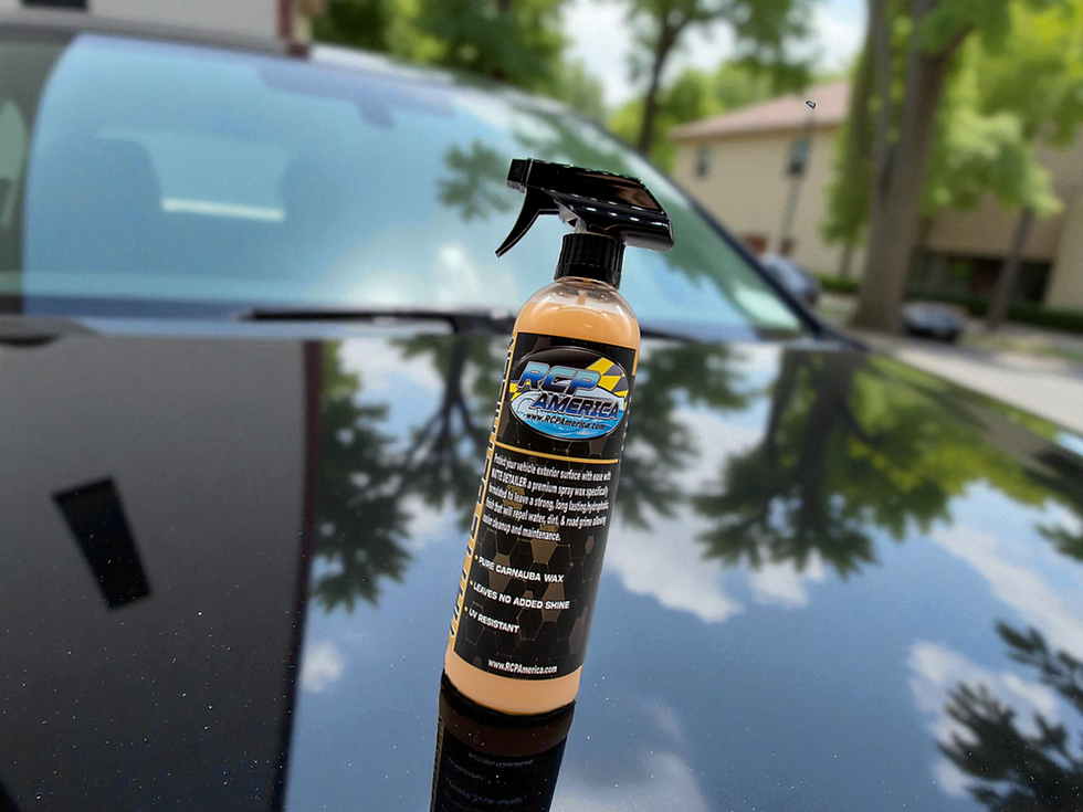 Matte Detailer 16 Ounce Bottle, on Top of a Car.