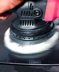 Buffing the hood of a car