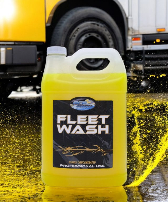 Yellow container of "Fleet Wash" with splashes, set against a truck wheel and yellow surface. Text: "Highly Concentrated, Professional Use."