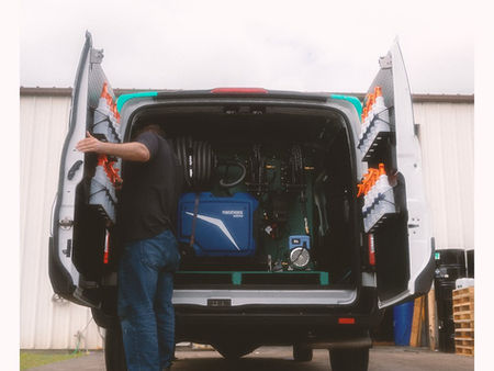     Custom detailing van interior with organized equipment and storage