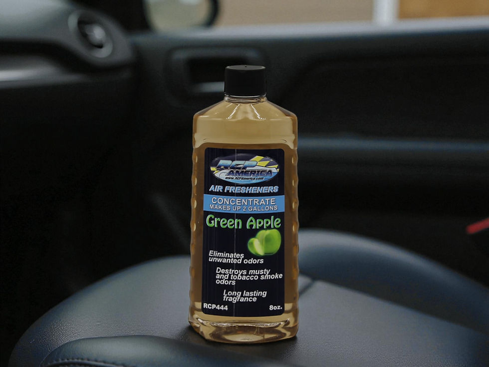 Green Apple Concentrate Sitting On A Leather Car Seat.