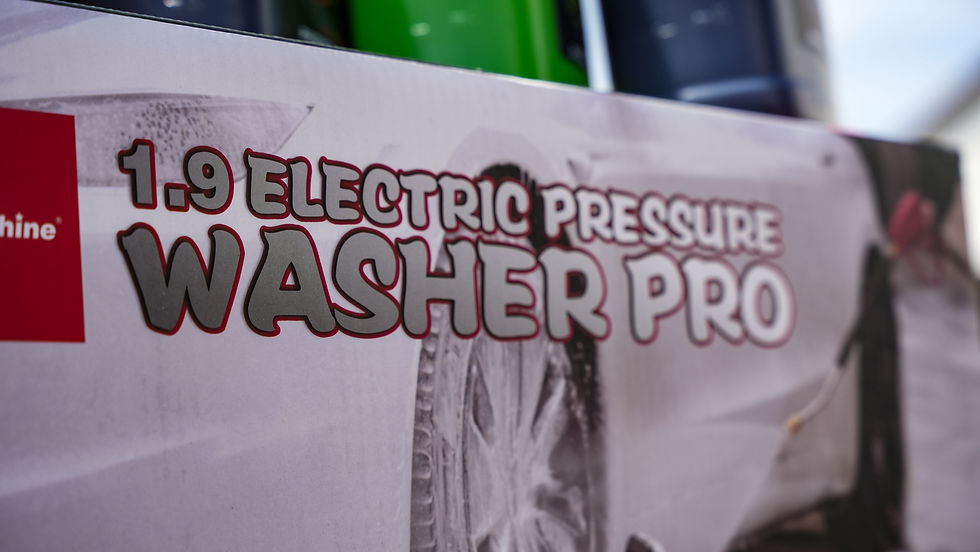 Close-up view of a Max Shine Pressure Washer on a driveway