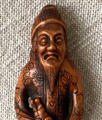 Wood Netsuke European Merchant
