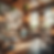 A warm and inviting interior of a small restaurant with a few tables, charming decor, and an intimate atmosphere, symbolizing the beginning of a restaurant business journey.