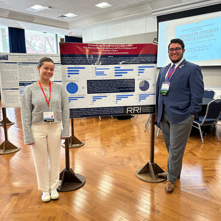 Alejandro and Emma with Poster