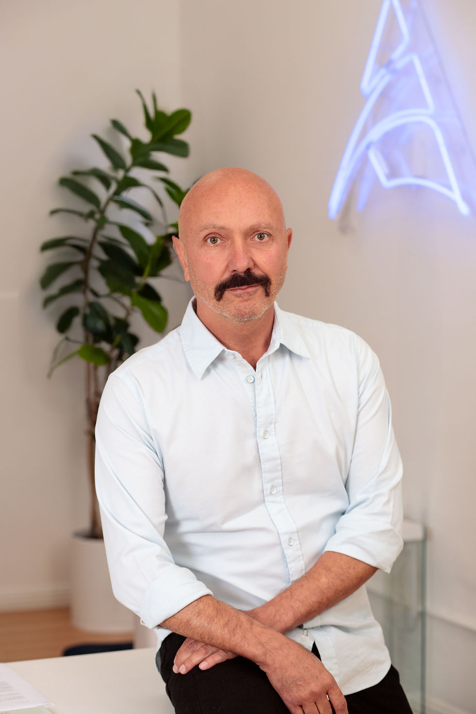 Professional corporate headshot of a Los Angeles attorney photographed in a office