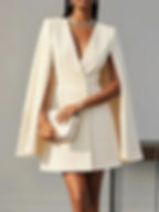 Elegant sleeveless blazer dress in a soft neutral tone, featuring a tailored fit and deep V-neckline. Paired with a matching