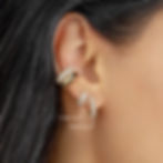 “Close-up of woman wearing gold hoop and stud earrings, minimalist elegant jewellery styled for everyday look”