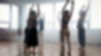 Eye-level view of a colorful dance studio with children practicing