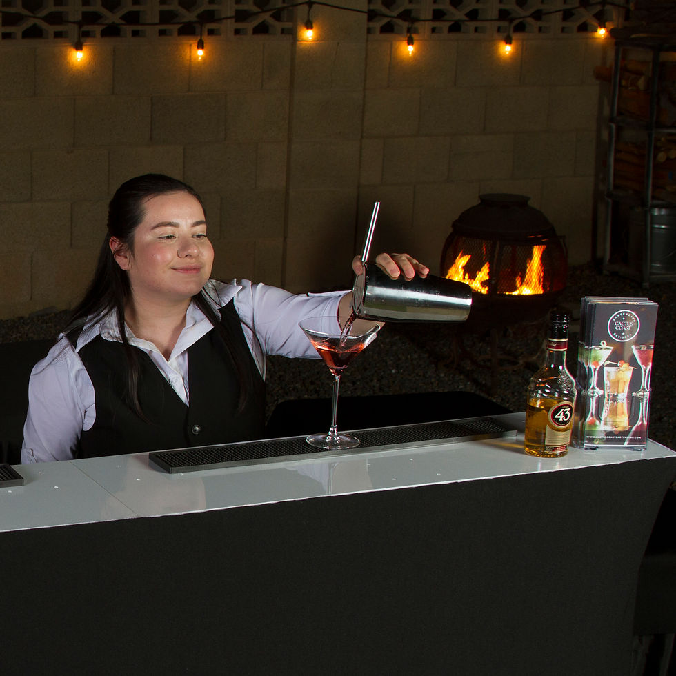 Phoenix mobile bartenders serving cocktails at luxury outdoor bar setup in Arizona desert