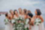 bridesmaids laughing with each other at Frederick Douglass maritime museum