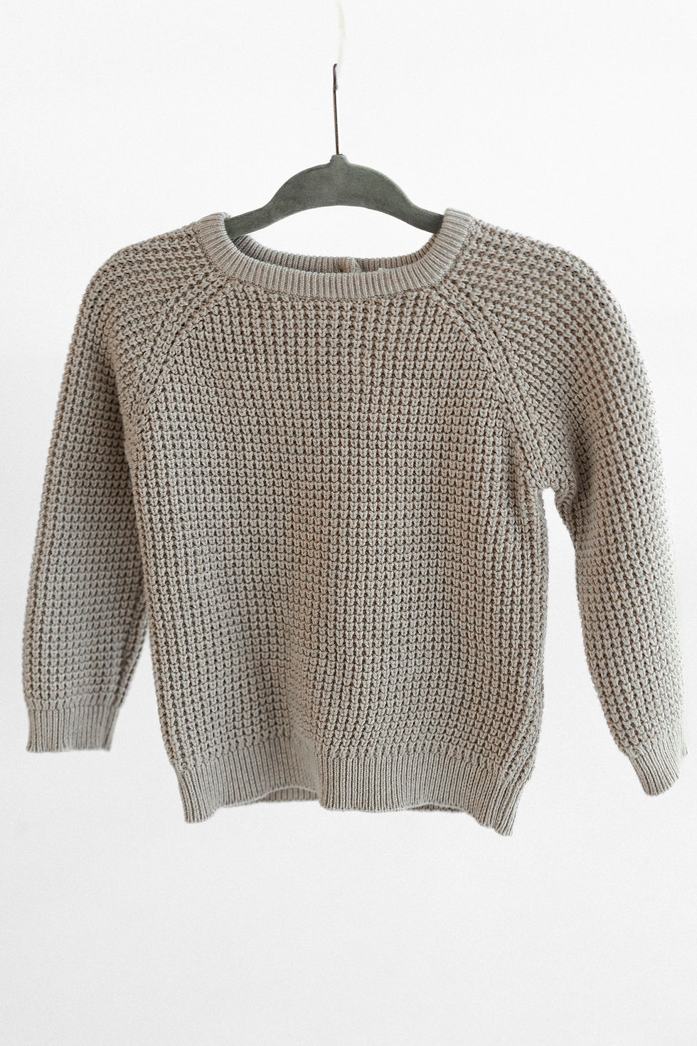 Lightweight knit sweaters for one year photography in Maryland. Simple, cozy layers that keep the fo