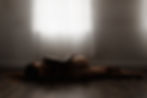 Baltimore boudoir photographer capturing a mom in lingerie in a private studio setting