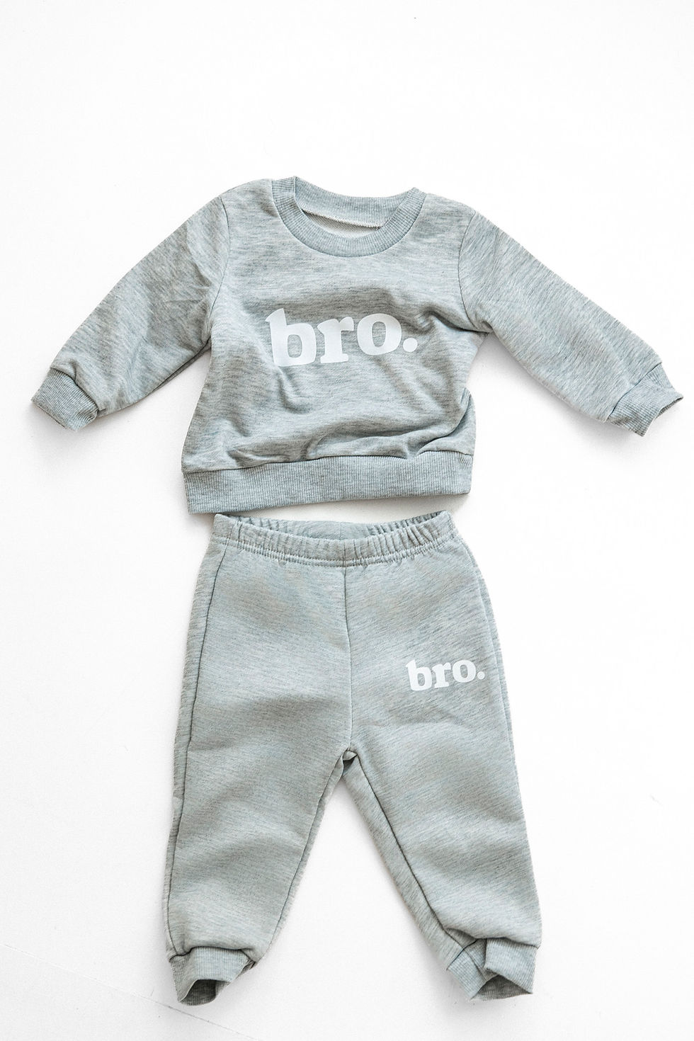 Cozy lounge-style sets for one year photography sessions in Maryland. Soft, relaxed outfits that kee
