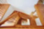 Wooden staircase in a holiday house for 15 guests.