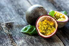 Delicious passion fruit on wooden backgr
