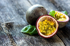 Delicious passion fruit on wooden backgr