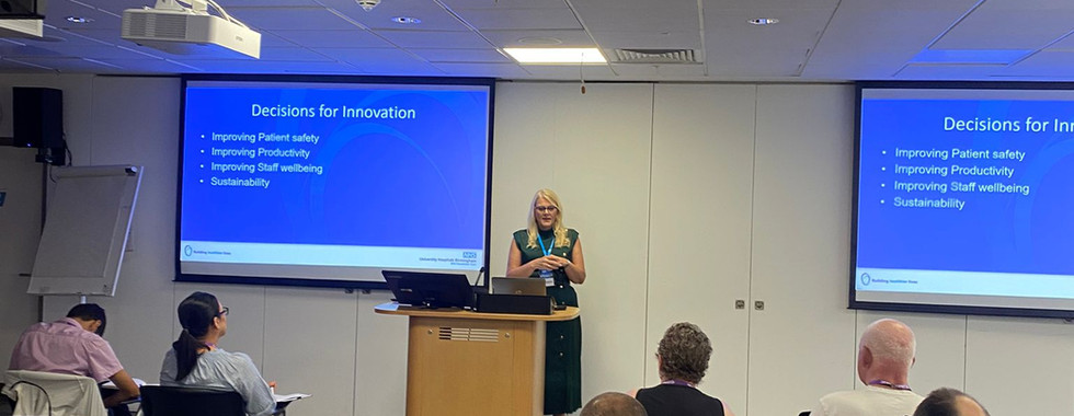 Sharon Fox, decontamination lead at University Hospital of Birmingham NHS Trust, discussing strategies for introducing medical innovation into healthcare trusts. The presentation focuses on engaging key decision makers early and involving end users to facilitate smoother implementation and early adoption of new infection control technologies.