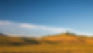 green-grass-field-under-blue-sky-3591318
