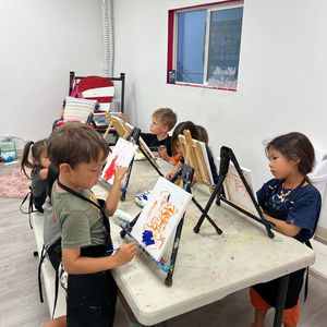 Little professional painters in action