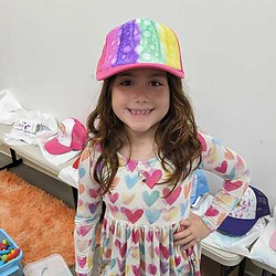 Student wearing a hat for her birthday