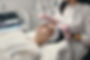 A client is receiving a microneedling treatment in a medspa.