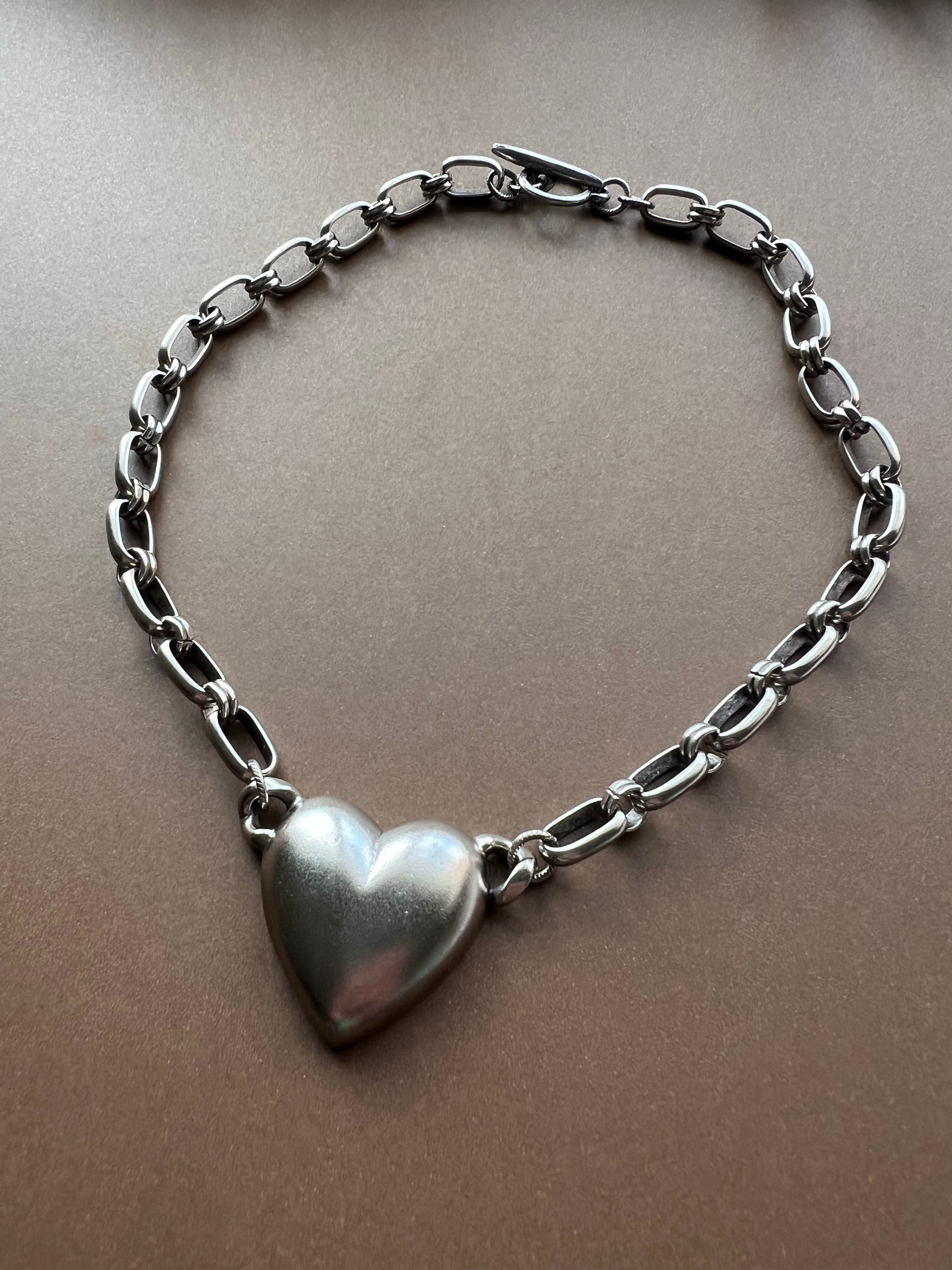 Dark silver chain with bold silver heart pendant