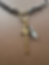 dark silver toned chain with gold connector and long cross with rhinestone accent