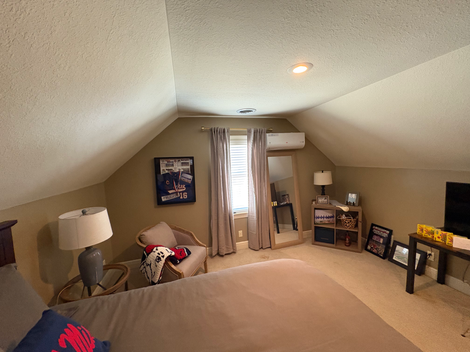 A bedroom that has been re-painted.